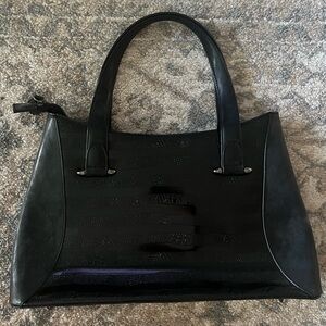 Black leather bag with printed design